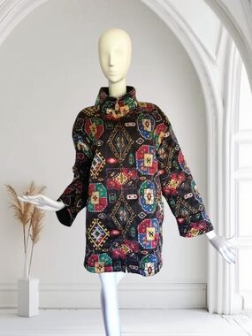 Gerry Weber  Jacket XXL.The outer fabric is made of 100% silk.